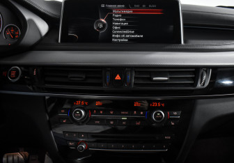Подержанный автомобиль BMW X6 2016 года (13 фото)