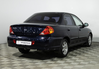 Подержанный автомобиль Kia Spectra Sedan 2008 года (5 фото)