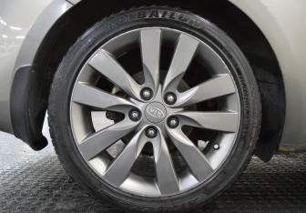 Подержанный автомобиль Kia Cerato Coupe 2010 года (9 фото)