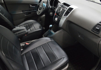 Подержанный автомобиль Kia Venga 2014 года (11 фото)