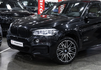 Подержанный автомобиль BMW X6 2018 года (2 фото)