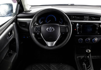 Подержанный автомобиль Toyota Corolla Sedan 2014 года (11 фото)