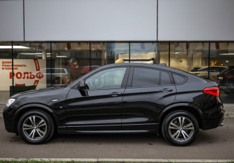 Подержанный автомобиль BMW X4 2015 года (8 фото)
