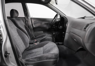 Подержанный автомобиль Kia Spectra Sedan 2007 года (14 фото)