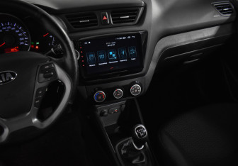 Подержанный автомобиль Kia Rio Sedan 2015 года (17 фото)