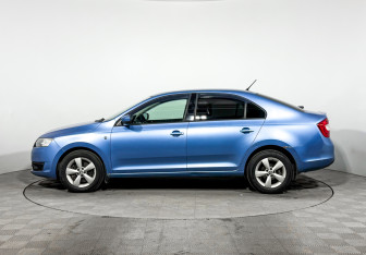 Подержанный автомобиль Skoda Rapid Liftback 2014 года (8 фото)