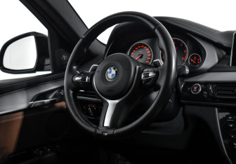 Подержанный автомобиль BMW X6 2016 года (16 фото)