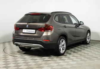 Подержанный автомобиль BMW X1 2013 года (5 фото)