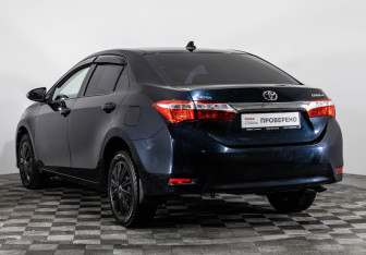 Подержанный автомобиль Toyota Corolla Sedan 2014 года (7 фото)