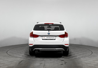Подержанный автомобиль BMW X1 2014 года (6 фото)