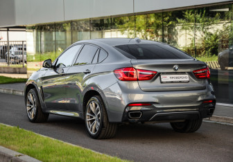Подержанный автомобиль BMW X6 2017 года (8 фото)