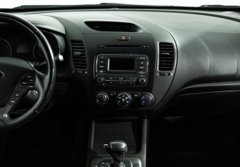 Подержанный автомобиль Kia Cerato Sedan 2013 года (14 фото)