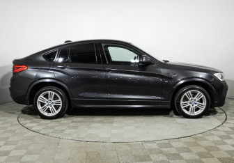 Подержанный автомобиль BMW X4 2016 года (4 фото)