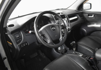 Подержанный автомобиль Kia Sportage 2007 года (9 фото)