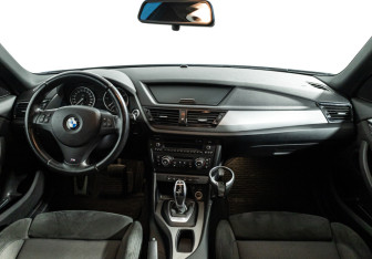 Подержанный автомобиль BMW X1 2014 года (13 фото)