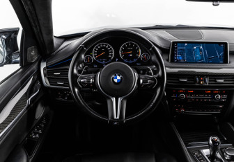 Подержанный автомобиль BMW X6 M 2017 года (13 фото)