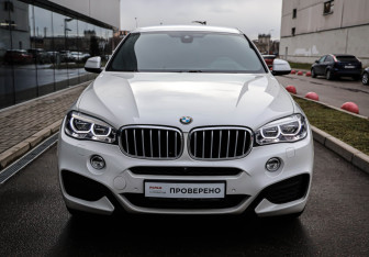 Подержанный автомобиль BMW X6 2018 года (2 фото)