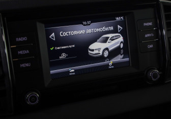 Подержанный автомобиль Skoda Karoq 2021 года (14 фото)