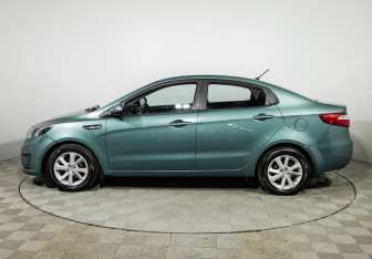 Подержанный автомобиль Kia Rio Sedan 2014 года (8 фото)