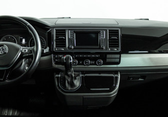 Подержанный автомобиль Volkswagen Multivan 2016 года (14 фото)