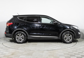 Подержанный автомобиль Hyundai Santa Fe 2014 года (4 фото)