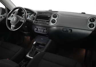 Подержанный автомобиль Volkswagen Tiguan 2014 года (10 фото)