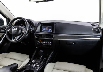 Подержанный автомобиль Mazda CX-5 2015 года (9 фото)