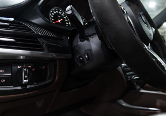 Подержанный автомобиль BMW X6 M 2015 года (26 фото)