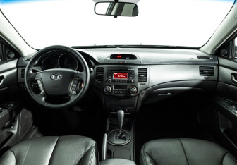 Подержанный автомобиль Kia Magentis 2010 года (13 фото)