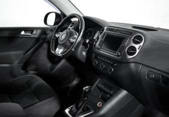 Подержанный автомобиль Volkswagen Tiguan 2016 года (14 фото)