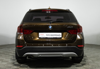 Подержанный автомобиль BMW X1 2014 года (6 фото)