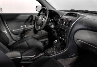 Подержанный автомобиль Nissan Almera Classic 2010 года (13 фото)