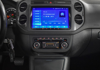 Подержанный автомобиль Volkswagen Tiguan 2012 года (15 фото)