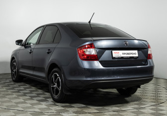 Подержанный автомобиль Skoda Rapid Liftback 2014 года (7 фото)