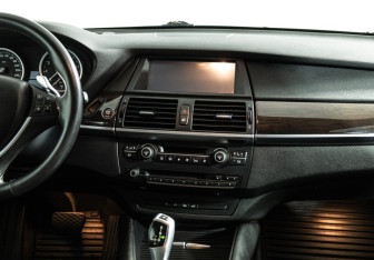 Подержанный автомобиль BMW X6 2009 года (14 фото)