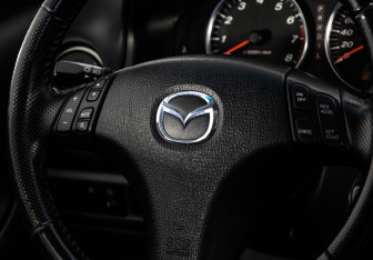 Подержанный автомобиль Mazda 6 Sedan 2005 года (11 фото)