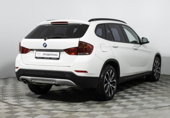 Подержанный автомобиль BMW X1 2013 года (5 фото)