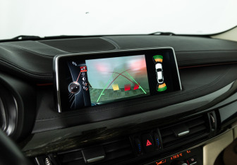 Подержанный автомобиль BMW X6 2015 года (15 фото)