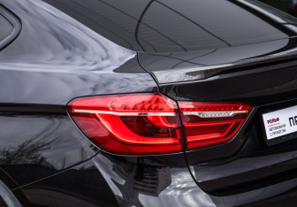 Подержанный автомобиль BMW X6 2017 года (9 фото)