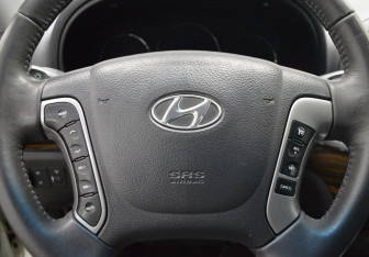 Подержанный автомобиль Hyundai Santa Fe 2012 года (15 фото)