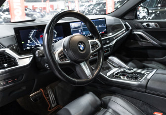 Подержанный автомобиль BMW X6 2023 года (16 фото)
