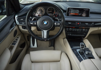 Подержанный автомобиль BMW X6 2017 года (14 фото)