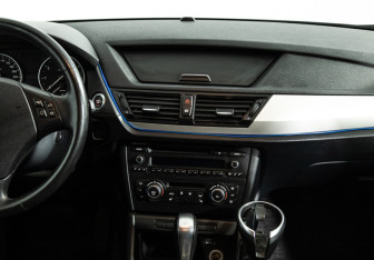 Подержанный автомобиль BMW X1 2014 года (14 фото)