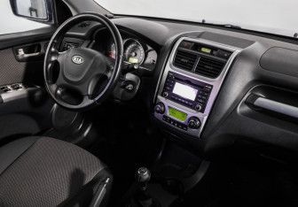 Подержанный автомобиль Kia Sportage 2010 года (9 фото)
