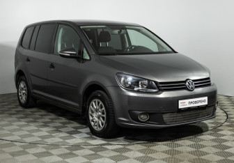 Подержанный автомобиль Volkswagen Touran 2010 года (3 фото)