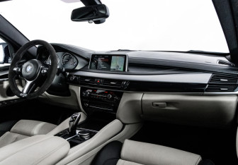 Подержанный автомобиль BMW X6 2015 года (13 фото)