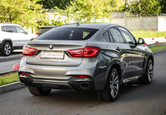 Подержанный автомобиль BMW X6 2017 года (6 фото)