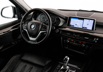 Подержанный автомобиль BMW X5 2016 года (15 фото)