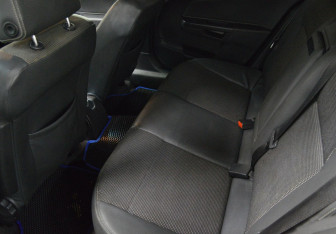 Подержанный автомобиль Opel Astra Sedan 2010 года (11 фото)