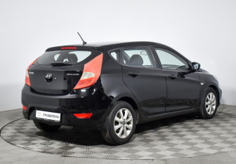 Подержанный автомобиль Hyundai Solaris Hatchback 2011 года (5 фото)